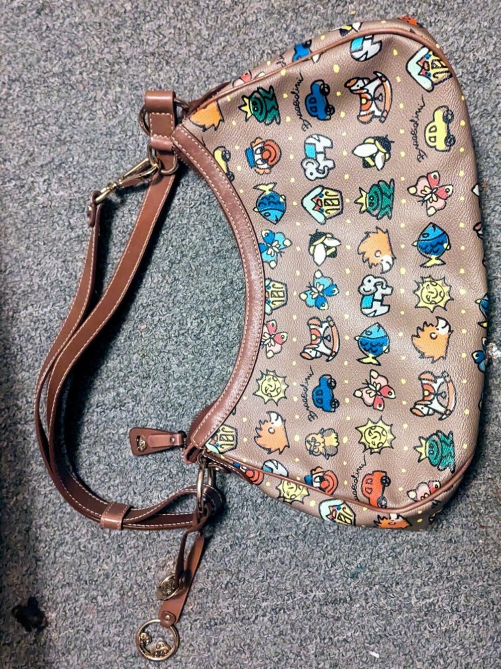 Braccialini leather purse with cartoon designs